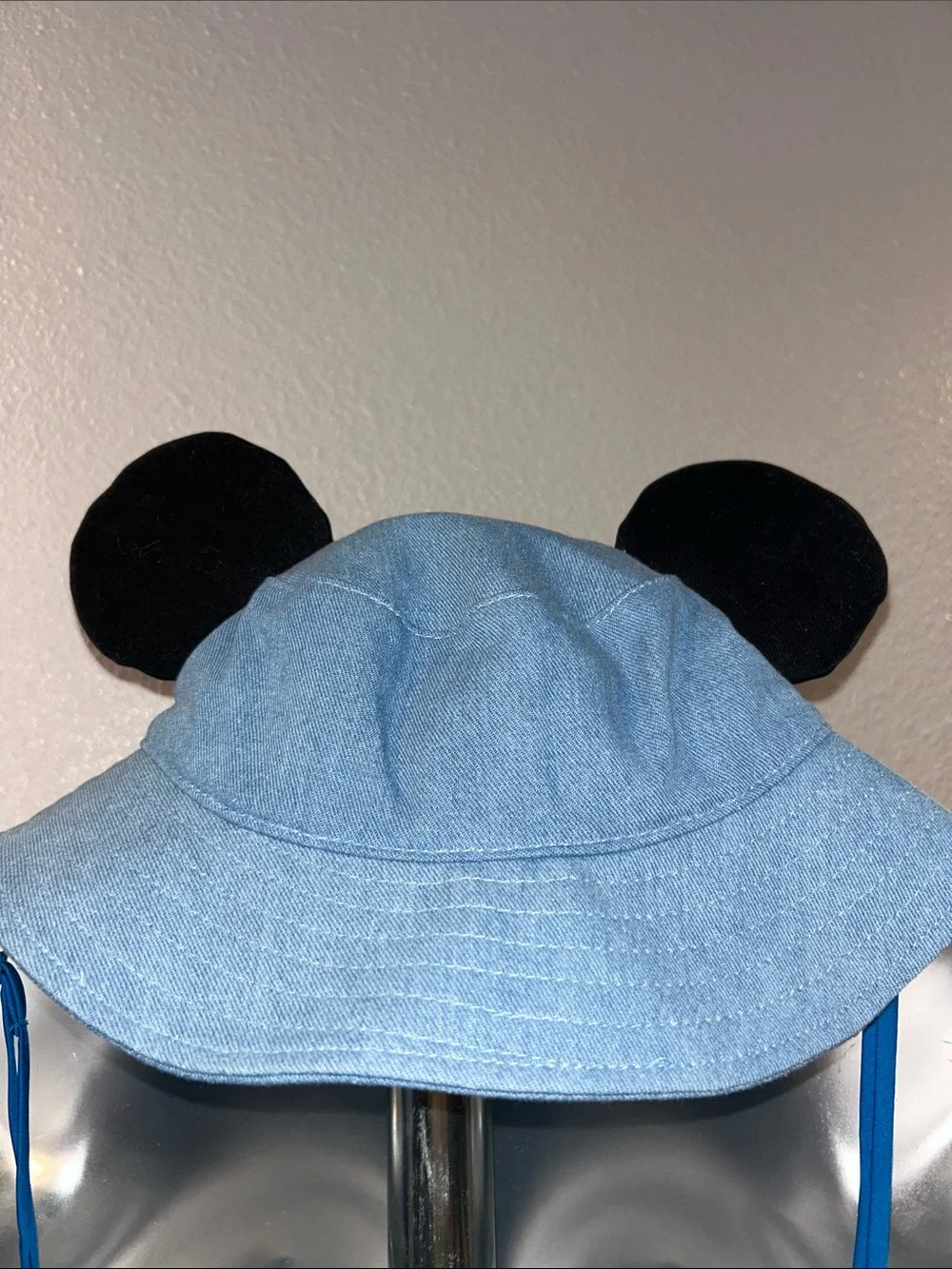 NWOT Disneyland Light Blue Daisy Embroidered Bucket Hat with Black Ears